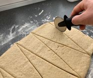 Dough cut in triangles