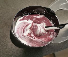 Folding blueberry mixture into whipped cream