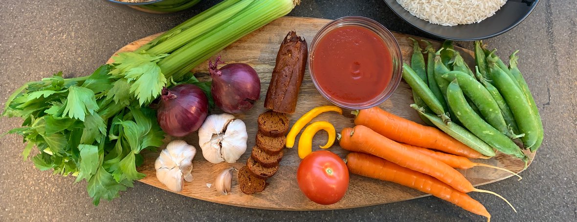 Ingredients for paella-inspired dish with plant-based chorizo