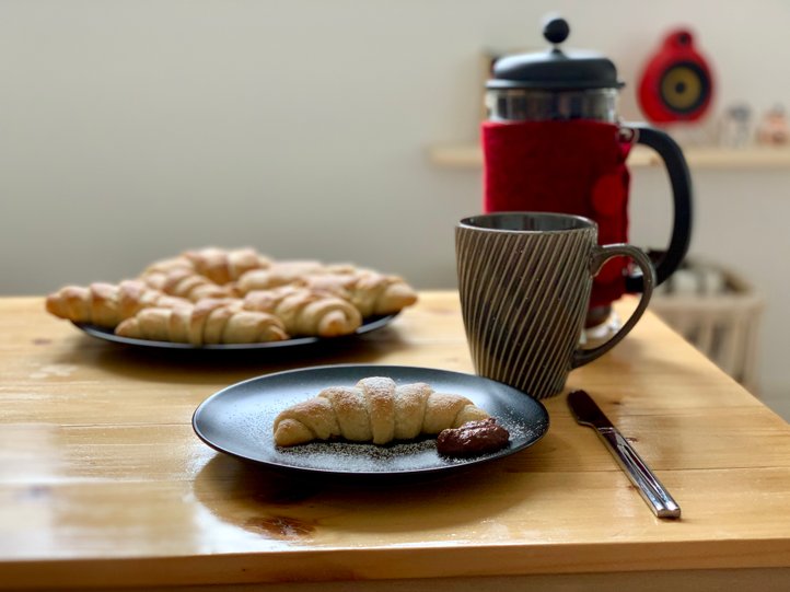 Vegan, shortcut croissant with homemade chocolate nut butter and freshly brewed coffee